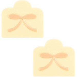 2 estremit del tronchetto di Natale con fiocco rosa (9 cm) - Cioccolato bianco